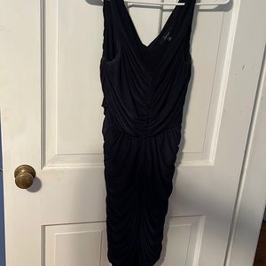 Navy blue ruched mini dress.  Great for a Junior size.